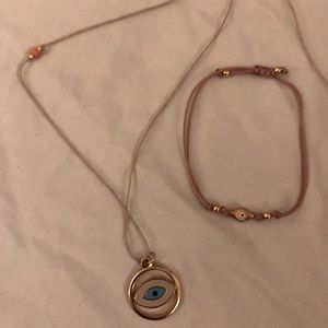 Evil eye necklace and bracelet. Adjustable rope.